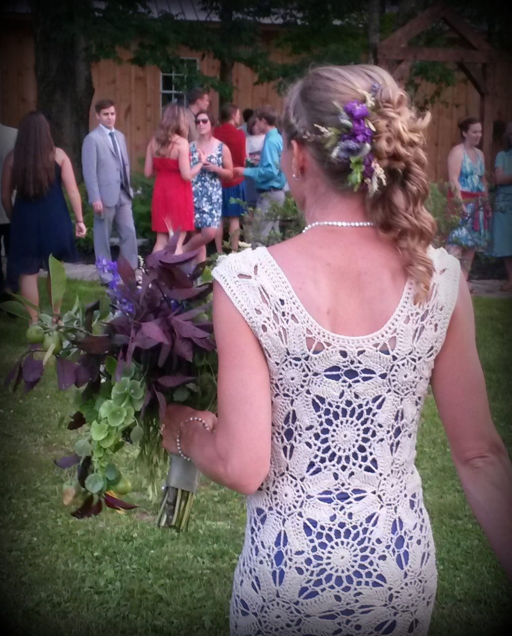 Crocheted dress, cascading bouquet, and hair piece!